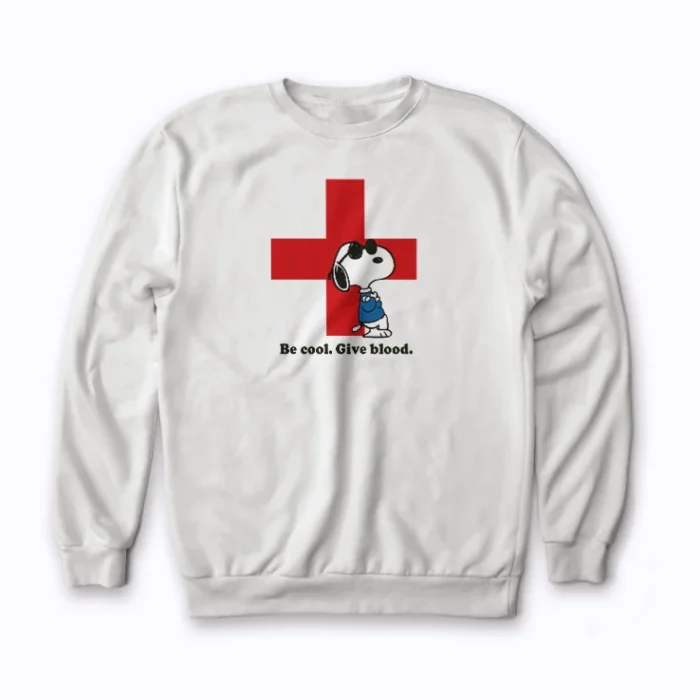 Red Cross Snoopy Sweatshirt featuring Snoopy and the Red Cross logo.