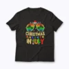 Santa Claus Sunglasses Beach Christmas in July T-shirt with festive beach design